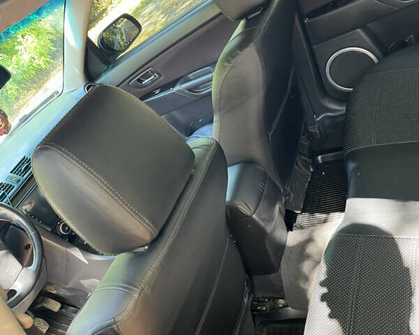 Чорний Мазда 3, об'ємом двигуна 1.6 л та пробігом 147 тис. км за 5500 $, фото 4 на Automoto.ua