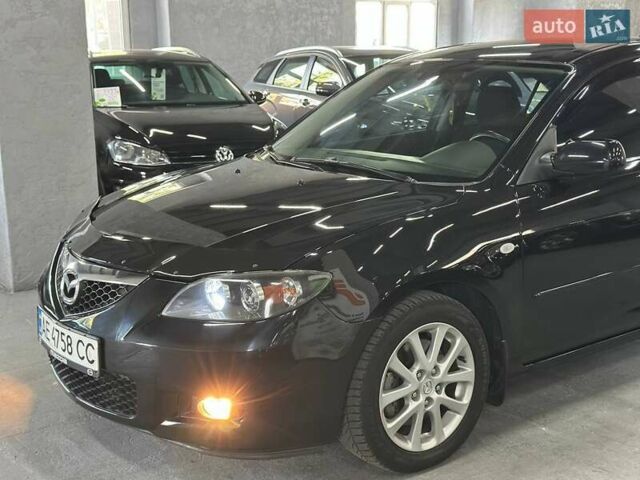 Чорний Мазда 3, об'ємом двигуна 2 л та пробігом 199 тис. км за 7299 $, фото 2 на Automoto.ua