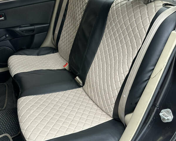 Черный Мазда 3, объемом двигателя 2 л и пробегом 200 тыс. км за 2700 $, фото 12 на Automoto.ua