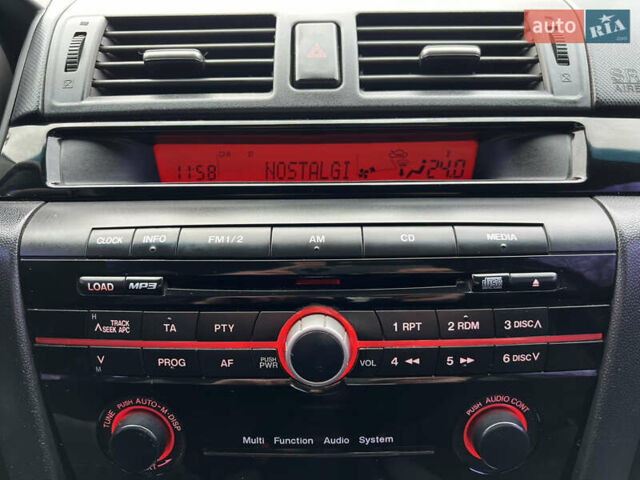 Черный Мазда 3, объемом двигателя 1.6 л и пробегом 256 тыс. км за 5450 $, фото 16 на Automoto.ua