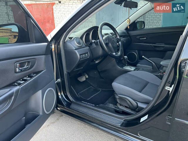 Чорний Мазда 3, об'ємом двигуна 2 л та пробігом 167 тис. км за 7500 $, фото 8 на Automoto.ua