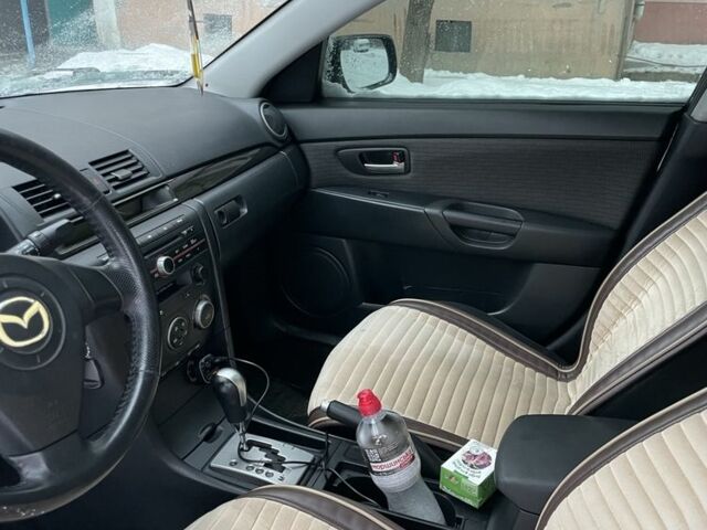 Чорний Мазда 3, об'ємом двигуна 1.6 л та пробігом 235 тис. км за 4000 $, фото 12 на Automoto.ua
