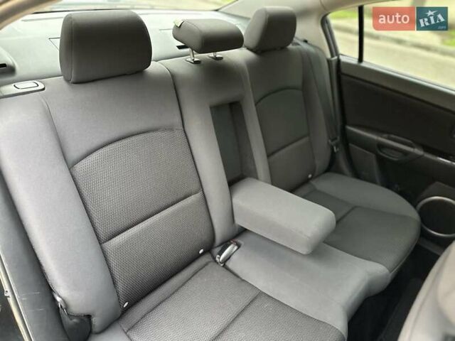 Черный Мазда 3, объемом двигателя 1.6 л и пробегом 130 тыс. км за 7700 $, фото 49 на Automoto.ua