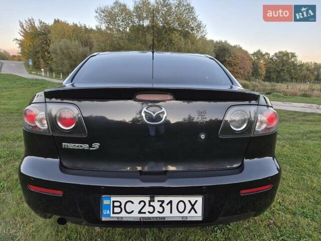 Чорний Мазда 3, об'ємом двигуна 1.6 л та пробігом 253 тис. км за 5200 $, фото 12 на Automoto.ua