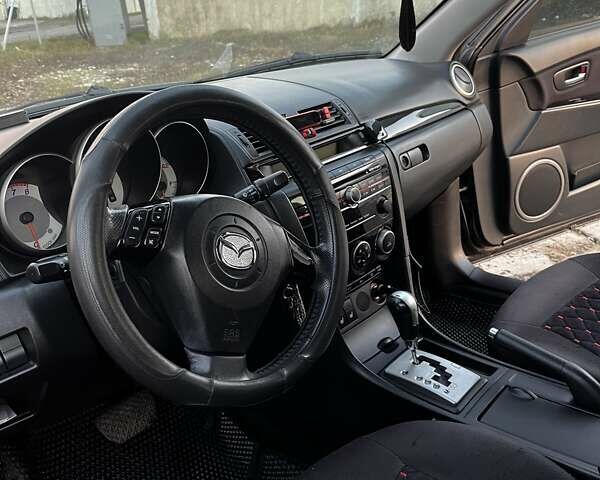 Черный Мазда 3, объемом двигателя 1.6 л и пробегом 153 тыс. км за 6200 $, фото 14 на Automoto.ua