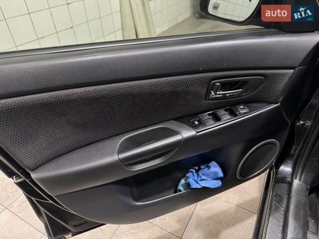Черный Мазда 3, объемом двигателя 1.6 л и пробегом 222 тыс. км за 5450 $, фото 19 на Automoto.ua