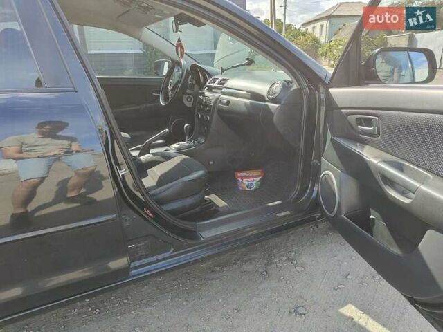 Чорний Мазда 3, об'ємом двигуна 1.6 л та пробігом 208 тис. км за 5500 $, фото 5 на Automoto.ua