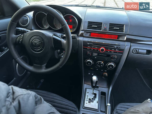 Чорний Мазда 3, об'ємом двигуна 1.6 л та пробігом 198 тис. км за 5499 $, фото 32 на Automoto.ua