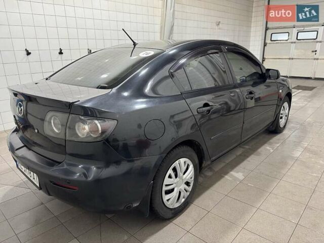Черный Мазда 3, объемом двигателя 1.6 л и пробегом 222 тыс. км за 5450 $, фото 7 на Automoto.ua