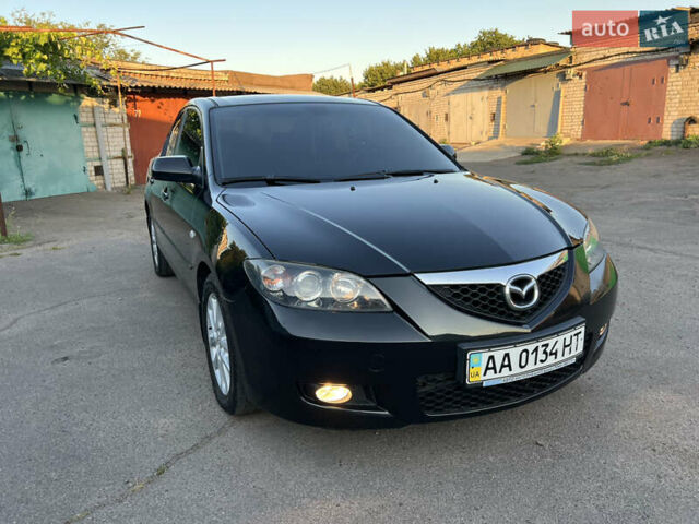 Чорний Мазда 3, об'ємом двигуна 2 л та пробігом 167 тис. км за 7500 $, фото 6 на Automoto.ua
