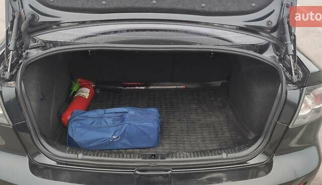 Черный Мазда 3, объемом двигателя 1.6 л и пробегом 146 тыс. км за 4800 $, фото 7 на Automoto.ua