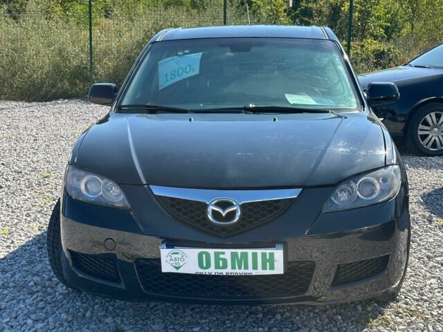 Черный Мазда 3, объемом двигателя 1.6 л и пробегом 179 тыс. км за 5200 $, фото 1 на Automoto.ua