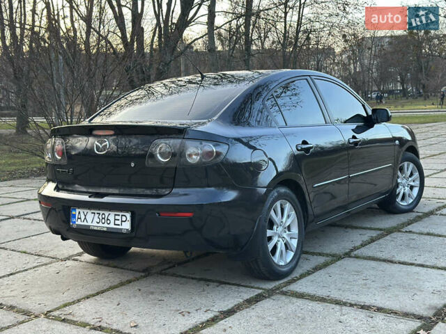 Чорний Мазда 3, об'ємом двигуна 1.6 л та пробігом 198 тис. км за 5499 $, фото 20 на Automoto.ua