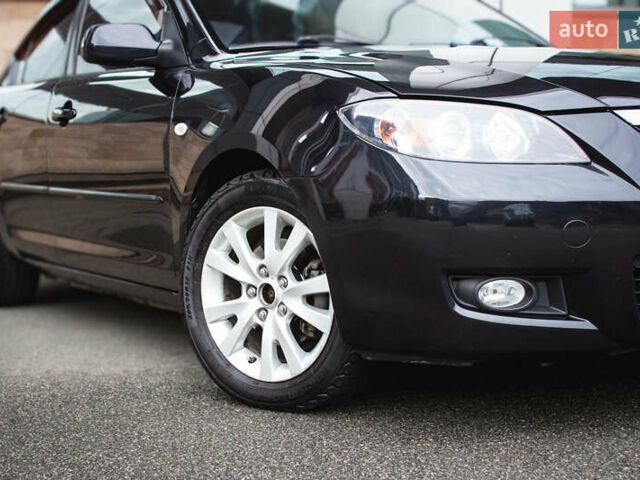 Черный Мазда 3, объемом двигателя 1.6 л и пробегом 185 тыс. км за 6350 $, фото 9 на Automoto.ua