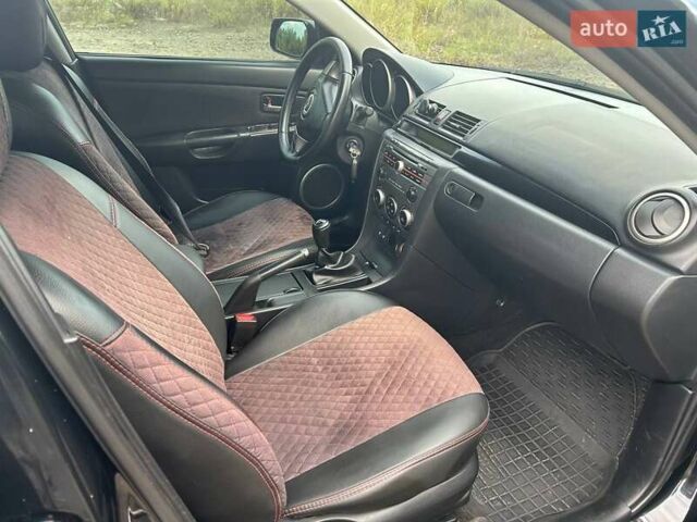 Черный Мазда 3, объемом двигателя 1.6 л и пробегом 233 тыс. км за 5500 $, фото 2 на Automoto.ua