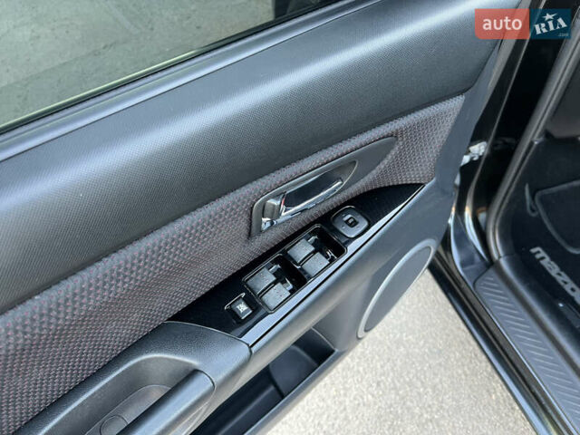 Чорний Мазда 3, об'ємом двигуна 2 л та пробігом 167 тис. км за 7500 $, фото 11 на Automoto.ua