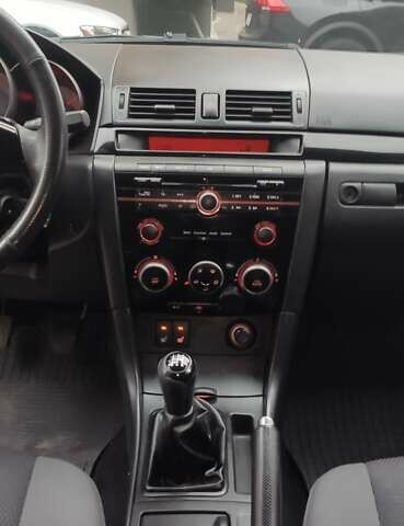 Черный Мазда 3, объемом двигателя 1.6 л и пробегом 146 тыс. км за 4800 $, фото 12 на Automoto.ua