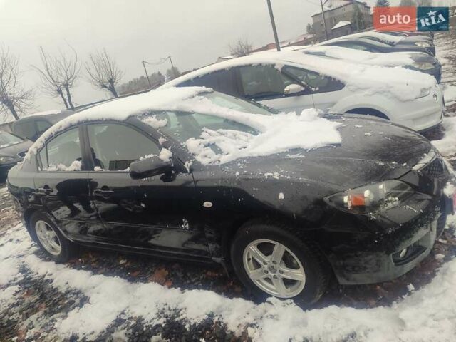 Черный Мазда 3, объемом двигателя 1.6 л и пробегом 180 тыс. км за 6000 $, фото 1 на Automoto.ua
