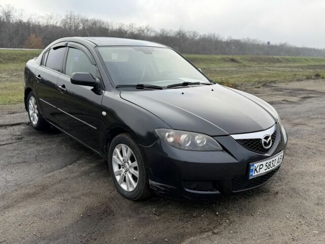 Черный Мазда 3, объемом двигателя 1.6 л и пробегом 225 тыс. км за 4250 $, фото 1 на Automoto.ua