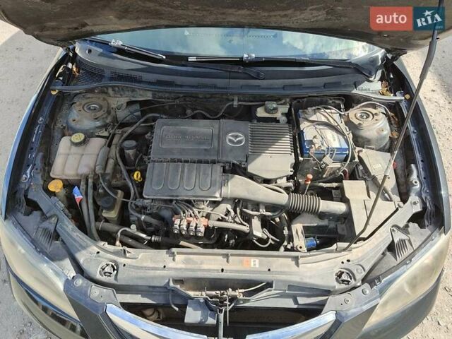 Чорний Мазда 3, об'ємом двигуна 1.6 л та пробігом 208 тис. км за 5500 $, фото 15 на Automoto.ua