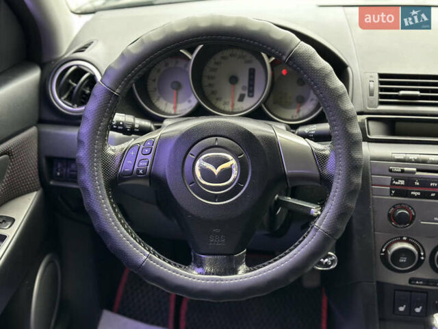 Чорний Мазда 3, об'ємом двигуна 1.6 л та пробігом 223 тис. км за 5450 $, фото 31 на Automoto.ua