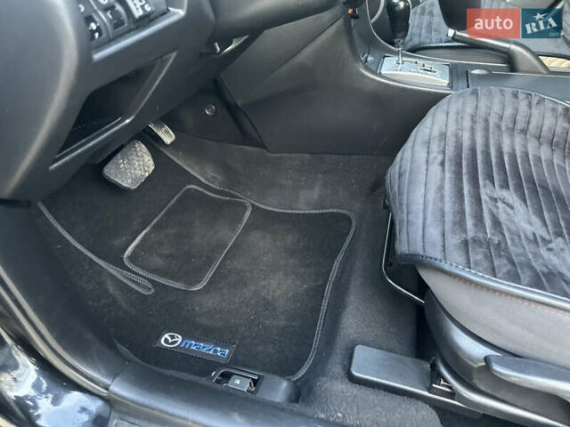 Чорний Мазда 3, об'ємом двигуна 1.6 л та пробігом 198 тис. км за 5499 $, фото 37 на Automoto.ua