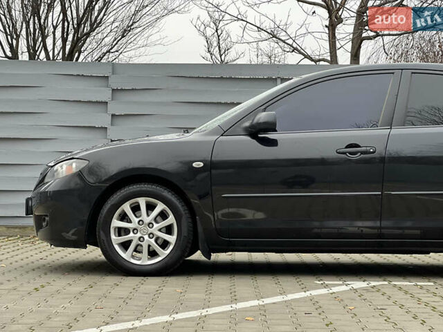 Черный Мазда 3, объемом двигателя 1.6 л и пробегом 256 тыс. км за 5450 $, фото 8 на Automoto.ua