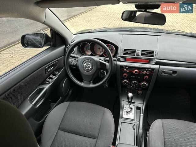 Черный Мазда 3, объемом двигателя 1.6 л и пробегом 130 тыс. км за 7700 $, фото 30 на Automoto.ua