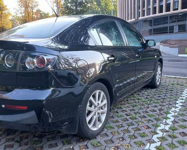 Черный Мазда 3, объемом двигателя 1.6 л и пробегом 121 тыс. км за 6000 $, фото 5 на Automoto.ua