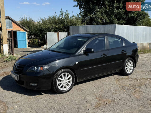 Чорний Мазда 3, об'ємом двигуна 1.6 л та пробігом 160 тис. км за 5999 $, фото 1 на Automoto.ua