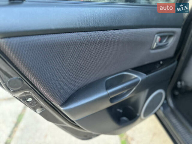 Чорний Мазда 3, об'ємом двигуна 1.6 л та пробігом 198 тис. км за 5499 $, фото 44 на Automoto.ua