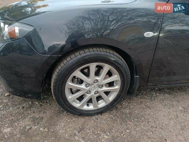 Черный Мазда 3, объемом двигателя 2 л и пробегом 221 тыс. км за 5700 $, фото 14 на Automoto.ua