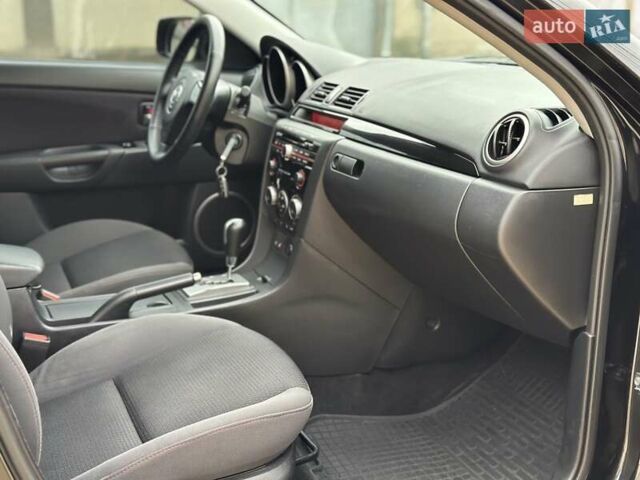 Черный Мазда 3, объемом двигателя 1.6 л и пробегом 130 тыс. км за 7700 $, фото 35 на Automoto.ua