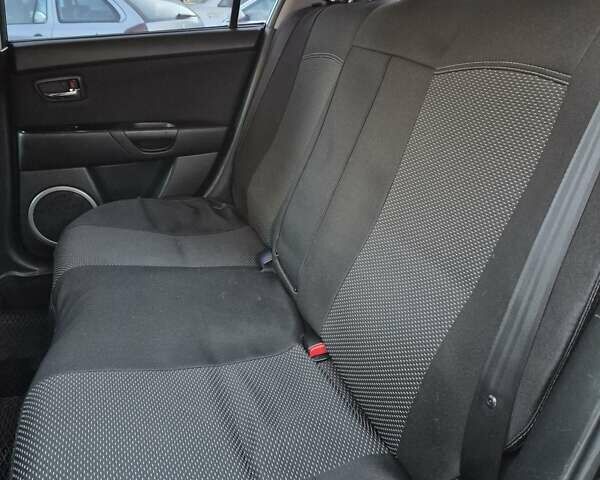 Чорний Мазда 3, об'ємом двигуна 1.6 л та пробігом 253 тис. км за 5200 $, фото 29 на Automoto.ua