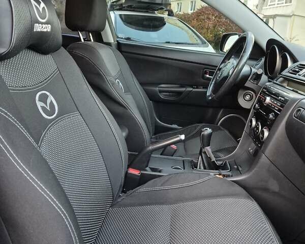 Чорний Мазда 3, об'ємом двигуна 1.6 л та пробігом 253 тис. км за 5200 $, фото 22 на Automoto.ua