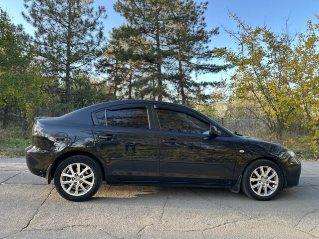 Черный Мазда 3, объемом двигателя 2 л и пробегом 192 тыс. км за 6500 $, фото 6 на Automoto.ua