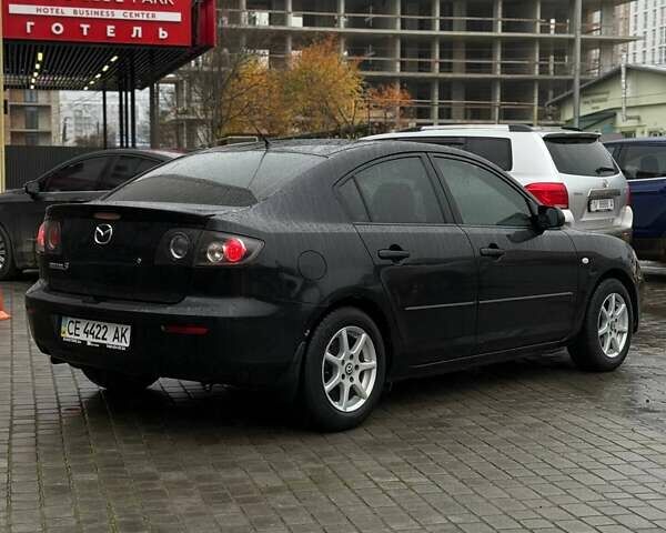 Черный Мазда 3, объемом двигателя 1.6 л и пробегом 89 тыс. км за 4800 $, фото 6 на Automoto.ua