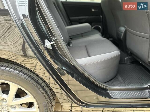 Черный Мазда 3, объемом двигателя 1.6 л и пробегом 130 тыс. км за 7700 $, фото 55 на Automoto.ua