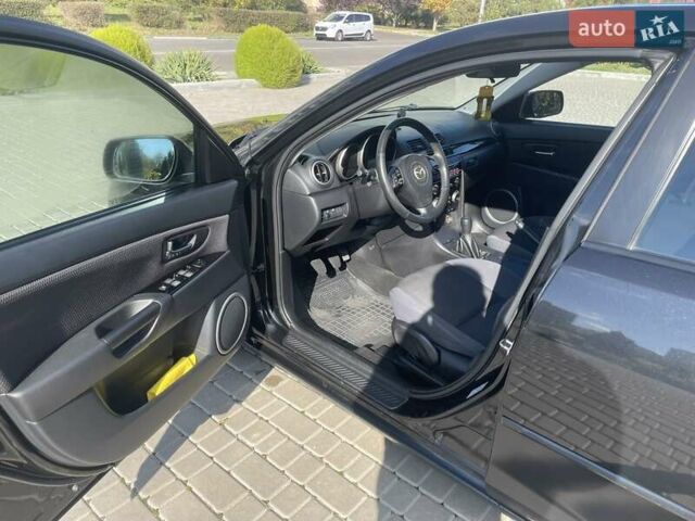 Черный Мазда 3, объемом двигателя 2 л и пробегом 175 тыс. км за 6000 $, фото 8 на Automoto.ua
