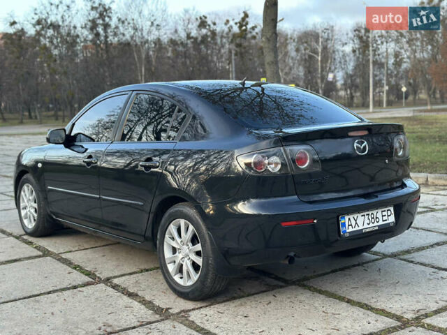 Чорний Мазда 3, об'ємом двигуна 1.6 л та пробігом 198 тис. км за 5499 $, фото 12 на Automoto.ua
