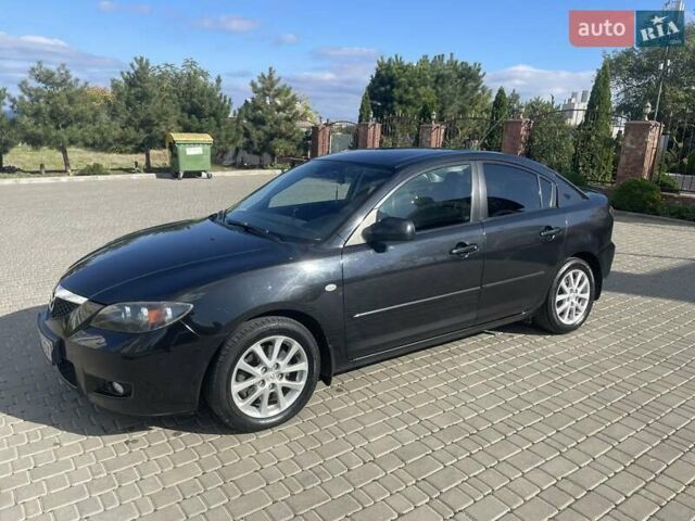 Черный Мазда 3, объемом двигателя 2 л и пробегом 175 тыс. км за 6000 $, фото 2 на Automoto.ua