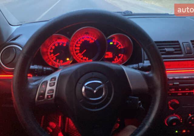 Черный Мазда 3, объемом двигателя 2 л и пробегом 204 тыс. км за 6700 $, фото 6 на Automoto.ua