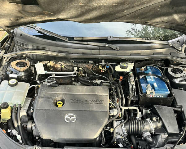 Чорний Мазда 3, об'ємом двигуна 2 л та пробігом 220 тис. км за 5500 $, фото 4 на Automoto.ua