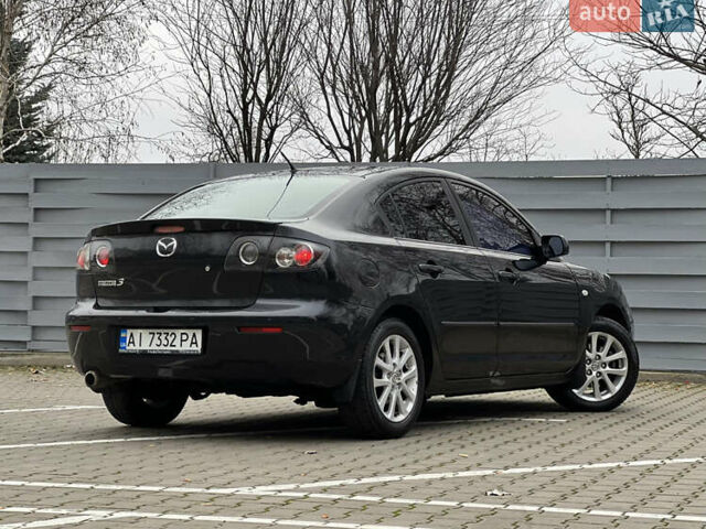 Черный Мазда 3, объемом двигателя 1.6 л и пробегом 256 тыс. км за 5450 $, фото 12 на Automoto.ua