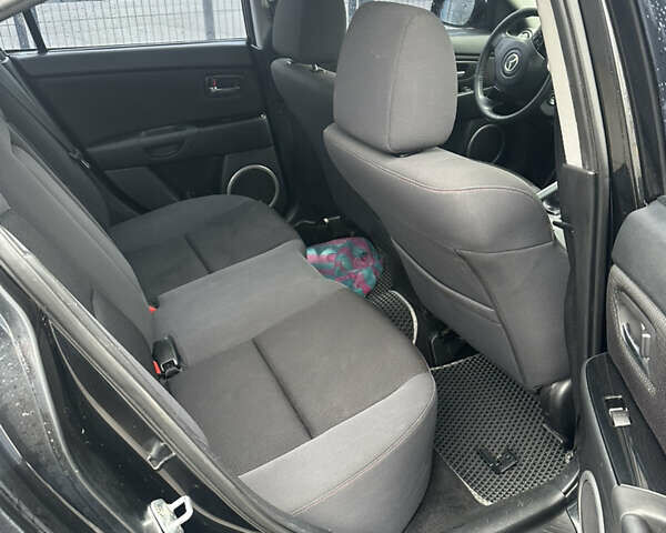Чорний Мазда 3, об'ємом двигуна 1.6 л та пробігом 135 тис. км за 4900 $, фото 8 на Automoto.ua