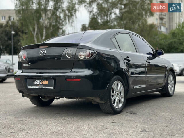 Чорний Мазда 3, об'ємом двигуна 1.6 л та пробігом 223 тис. км за 5450 $, фото 17 на Automoto.ua