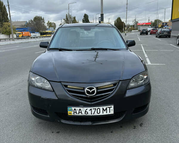 Черный Мазда 3, объемом двигателя 2 л и пробегом 200 тыс. км за 2700 $, фото 6 на Automoto.ua