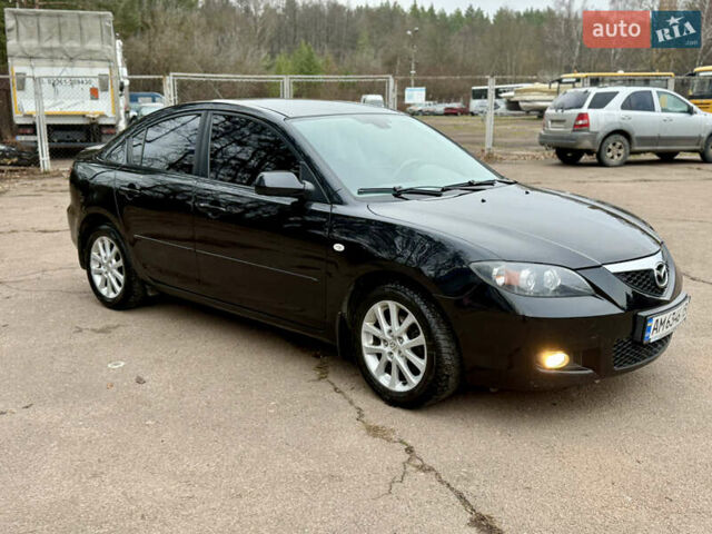 Чорний Мазда 3, об'ємом двигуна 1.6 л та пробігом 183 тис. км за 6150 $, фото 23 на Automoto.ua