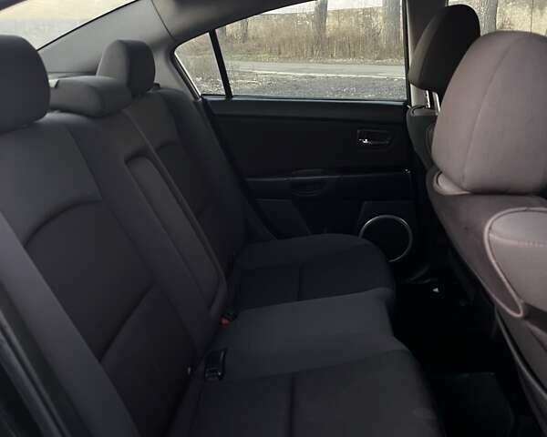 Черный Мазда 3, объемом двигателя 1.6 л и пробегом 153 тыс. км за 6200 $, фото 16 на Automoto.ua