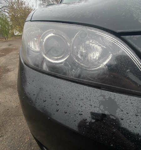 Черный Мазда 3, объемом двигателя 2 л и пробегом 182 тыс. км за 5500 $, фото 8 на Automoto.ua